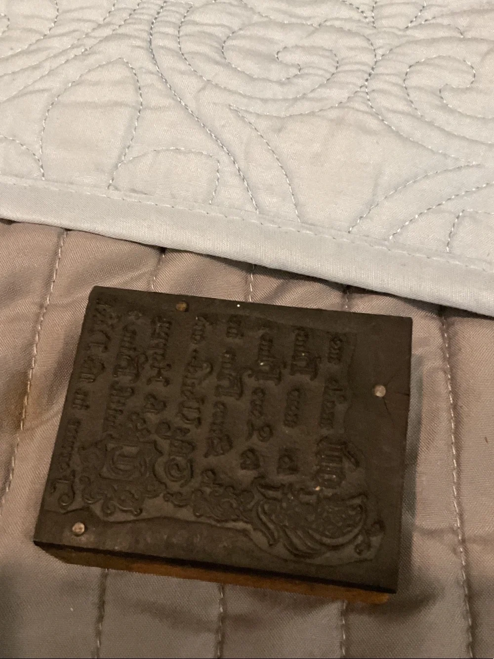 Vintage letterpress printing block.